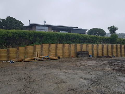 Timber Pole Retaining Wall, Soleares Ave, Port Hills, Christchurch 