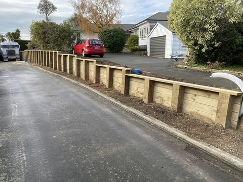 Square Timber Pole Retaining Wall - Cashmere 