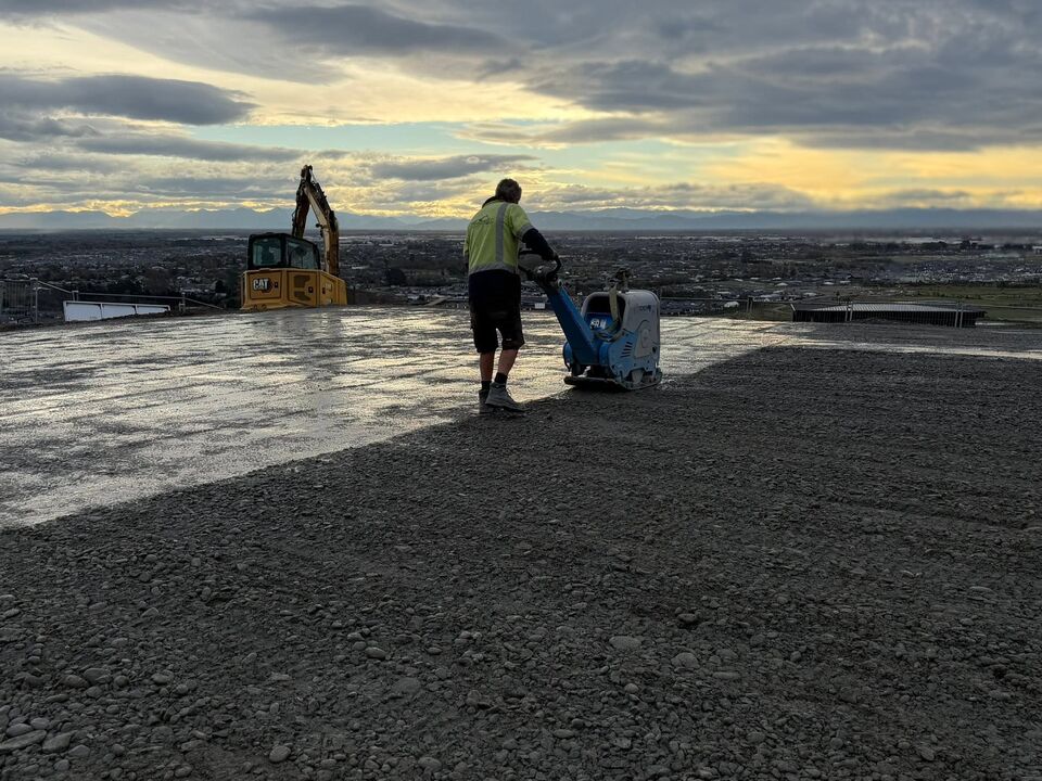 Compacting aggregate fill during shed pad construction in Canterbury
