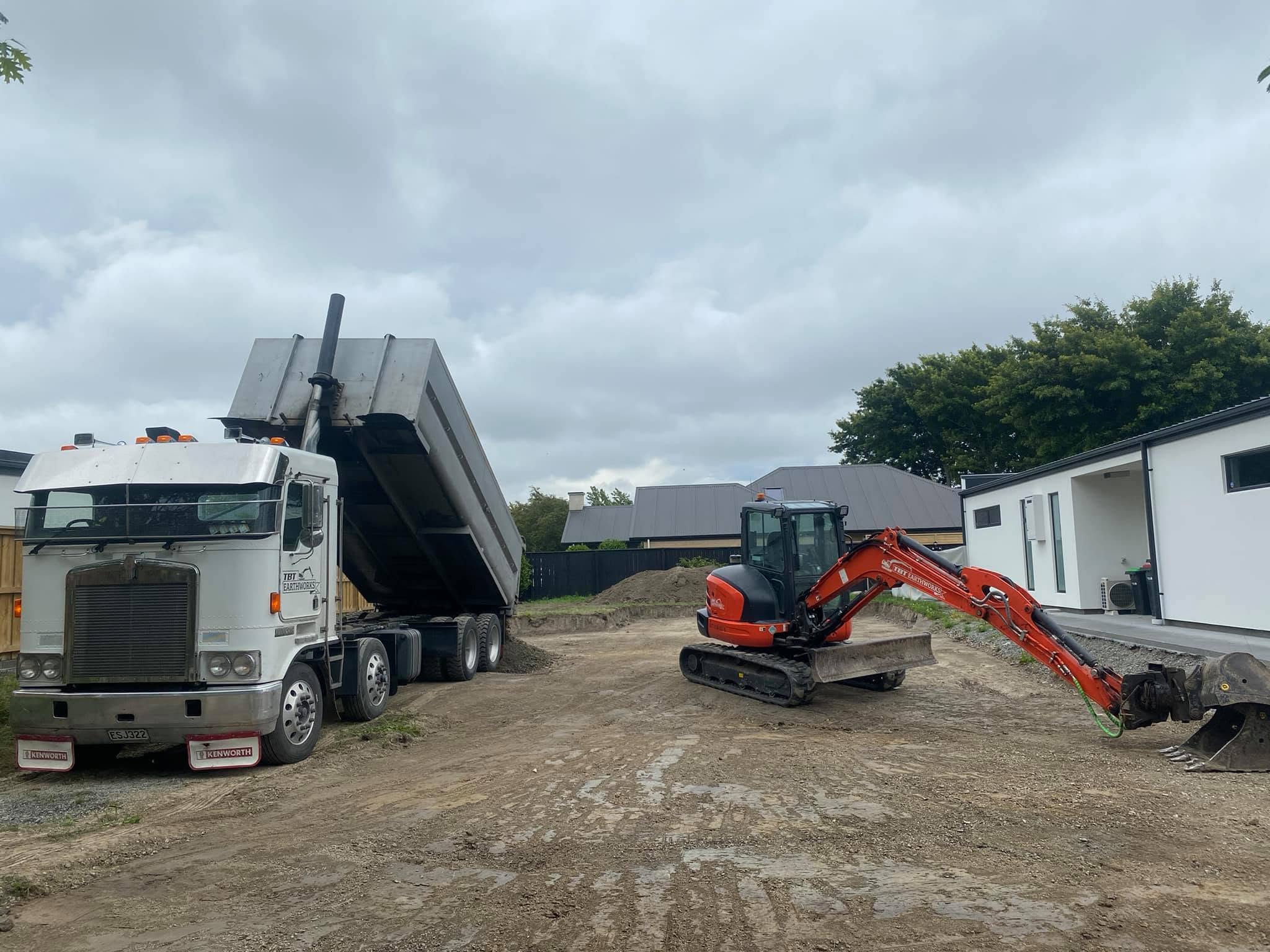 TBT Earthworks truck and excavator supporting augering work Christchurch