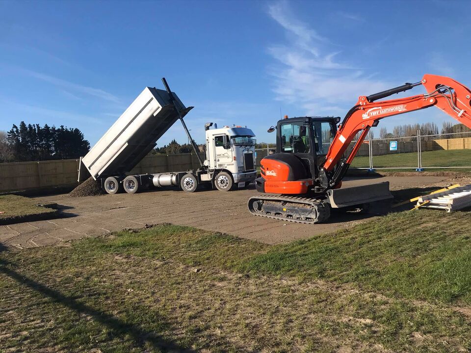 TBT Earthworks truck and excavator working on a rural Canterbury property